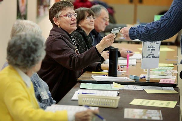 Federal Judge: Kansas Voter ID More Likely to Disenfranchise Eligible Voters than Prevent Fraud