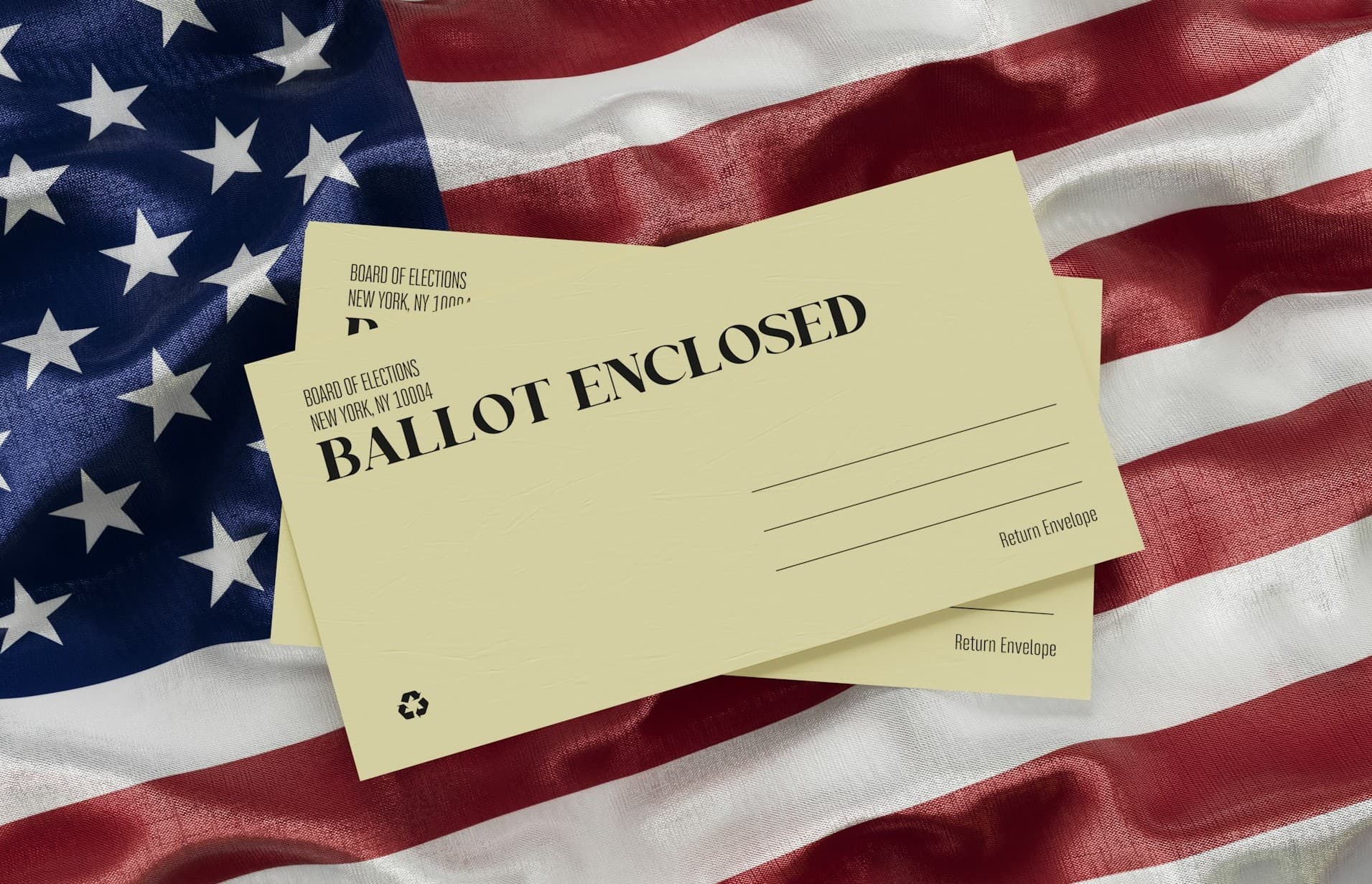 Stack of ballots on American flag. 