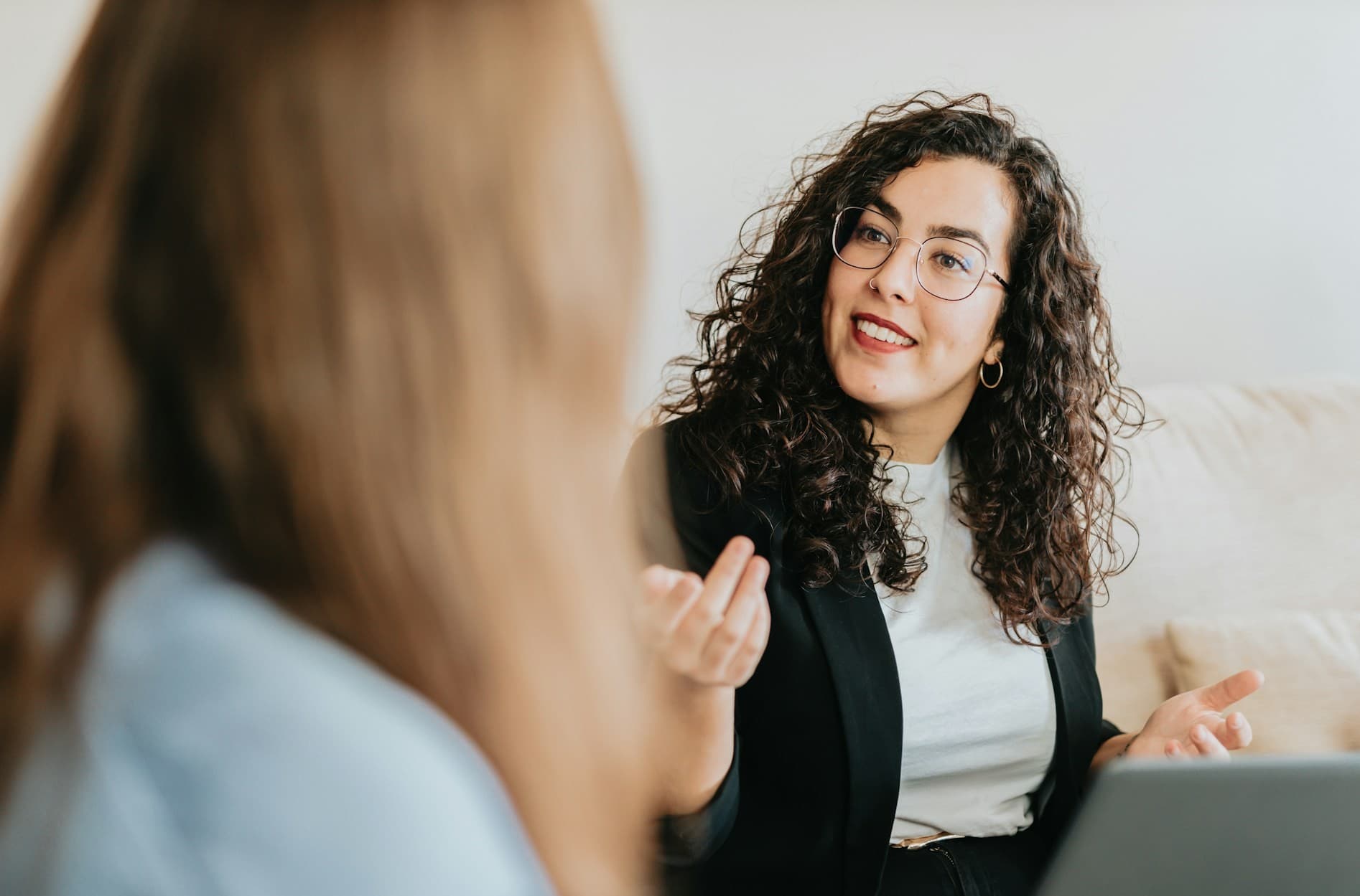 Two women having a conversation.