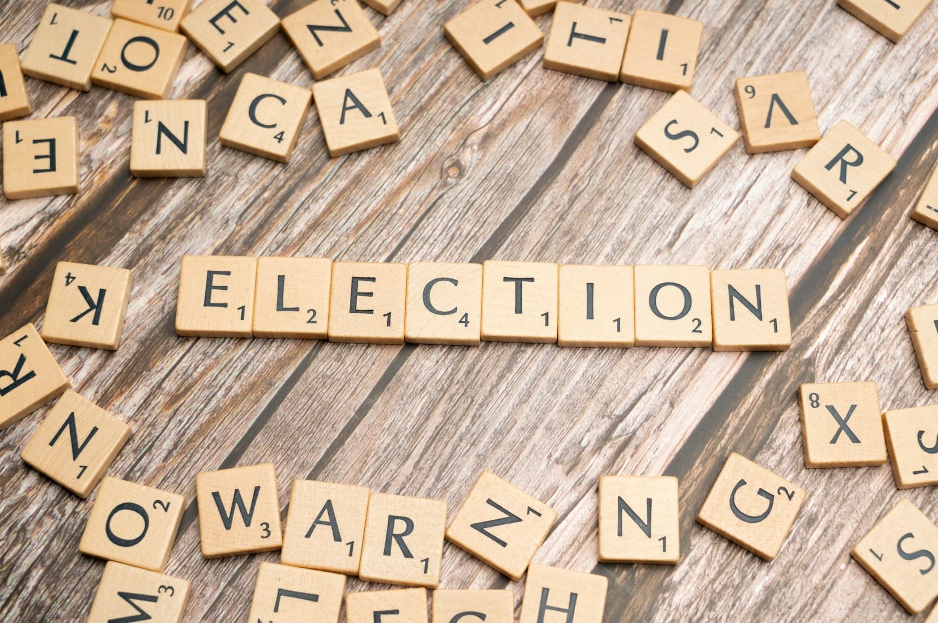 Scrabble pieces that spell out election. 