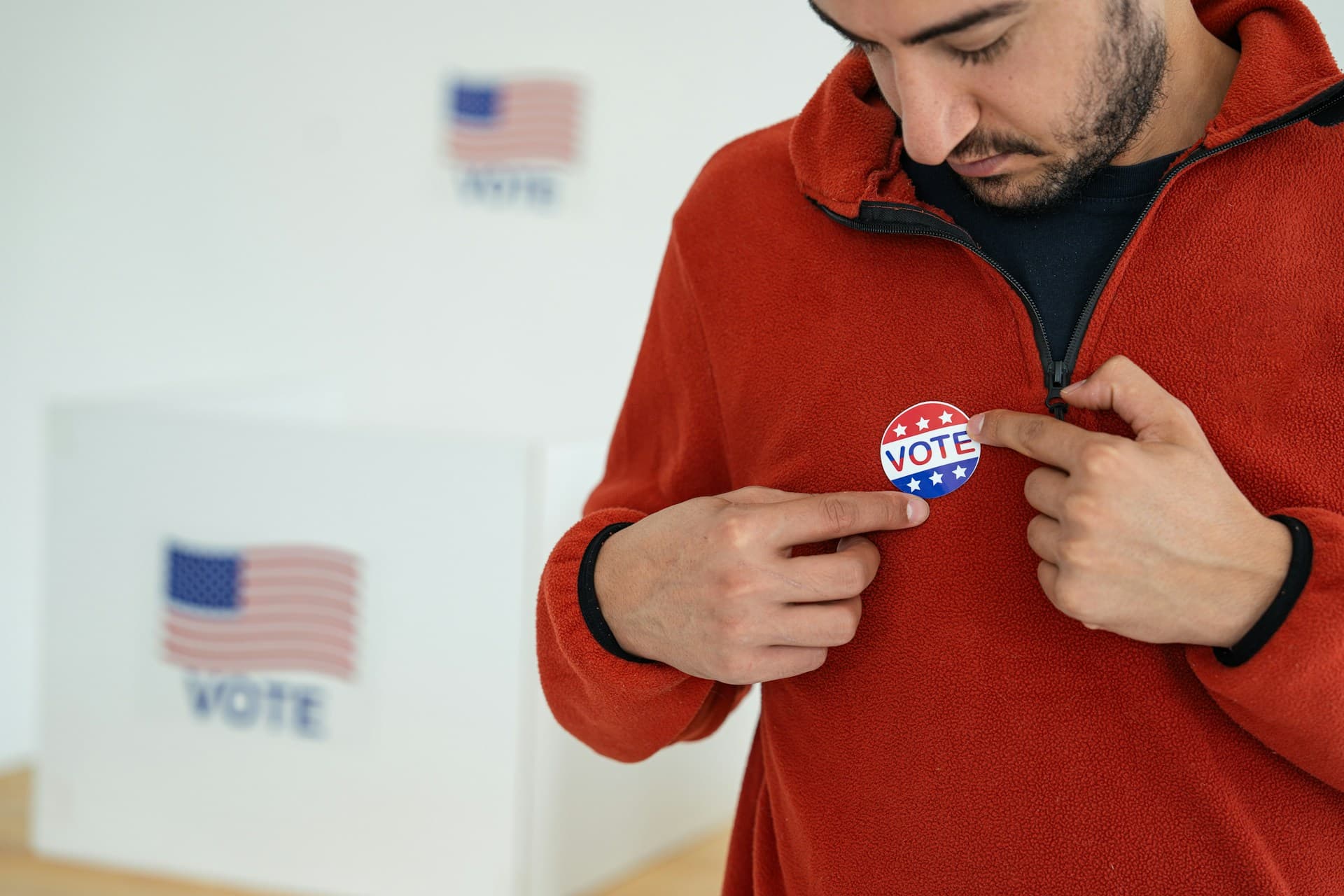 person with a voted sticker. 