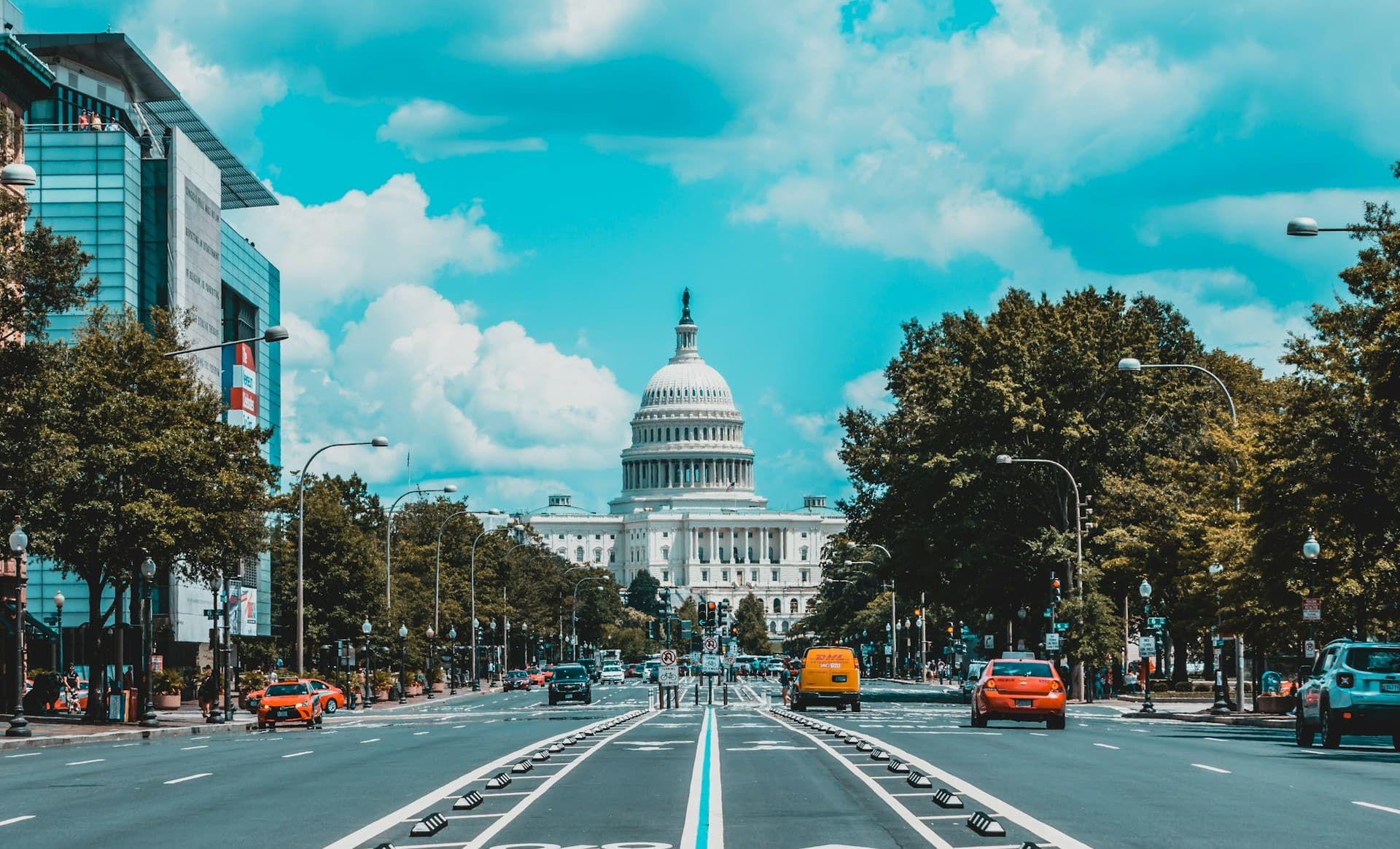 Washington DC street with capitol building in background. 